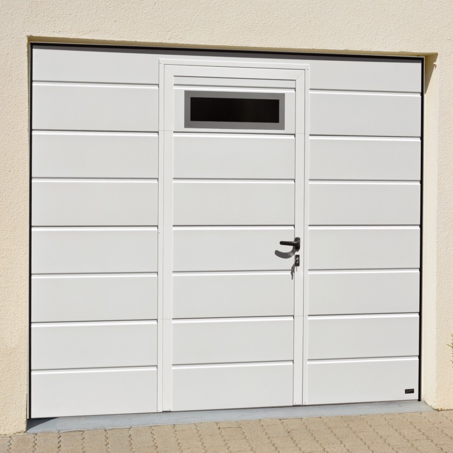 Joint bas de seuil de porte de garage sectionnelle avec portillon